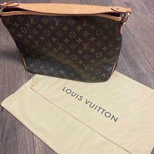 Retired Louis Vuitton monogram bag in like new condition.
